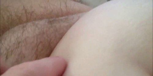 Rubbing her hairy MILF pussy