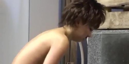 Girl similar to jenne is dressed as man in sauna