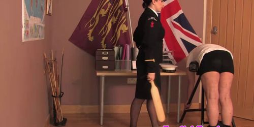 Police dominatrix paddles colleague over desk