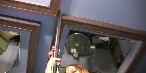 Slim blondie rubs her pussy on the stripper pole