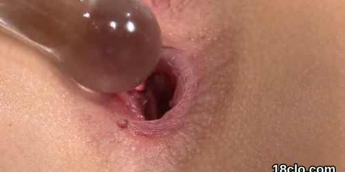 Lovely nympho is gaping juicy twat in closeup and coming