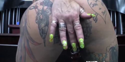 Tattooed MILF with piercings loves to fuck hard