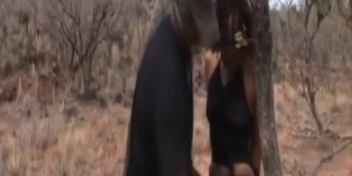 Hot african slut gets carried by two dudes under the hot african sun