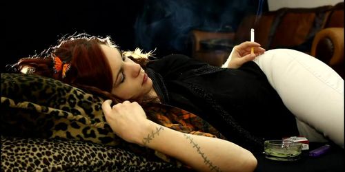 The beautiful young redhead girl Emily smoking sexy