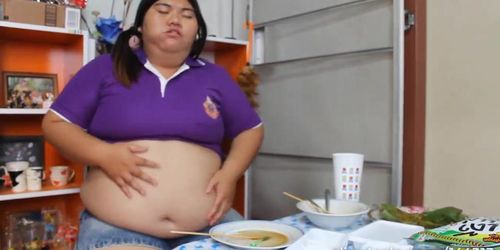 Asian BBW stuffing her fat belly