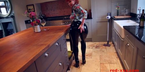 Red XXX fucks herself with a toy while in latex pants - video 1