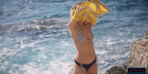Sexy blonde model strips naked outdoor and teases us