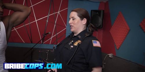 Kinky cops sucking a fat black dong for fun