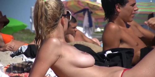 Perky Beach Teen Boobs (Incredible Topless Babe Shows Her Large, Pert And Gravity-Defying Boobs)