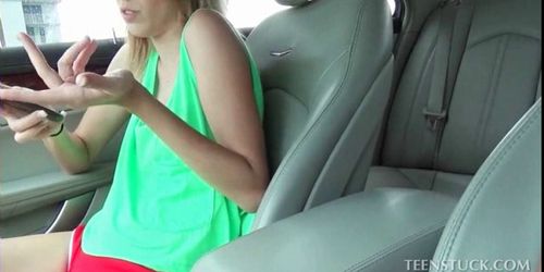 Cutie strips and plays with pink cunt in the car