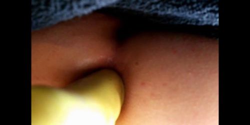 anal dildoing close up