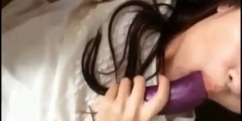 hot korean teen masturbates using eggplant