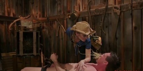 Blonde cowgirl pulling off bound mans dong