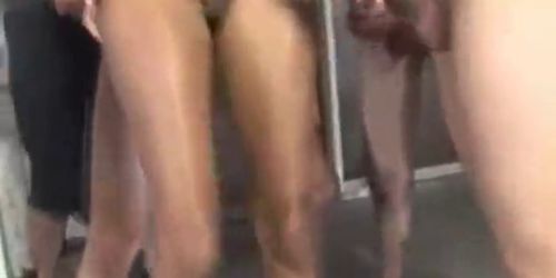 White Seeds Spraying on Her Ebony Face