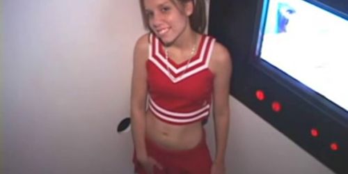 Teen Cheerleader Blowing Total Strangers in the Gloryhole