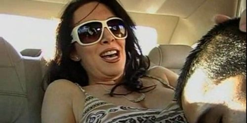 Busty MILF eating cock on the backseat of a car