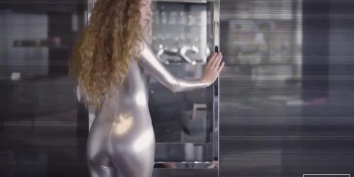 Girl Posing In Shiny Silver Spandex Catsuit 