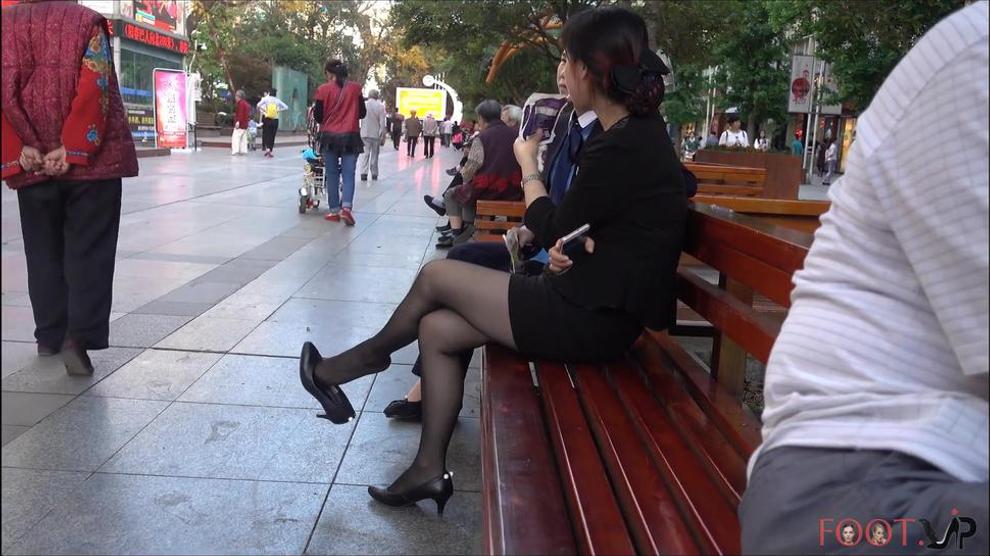 Chinese Office Lady Having A Break And Dangling Her Heels