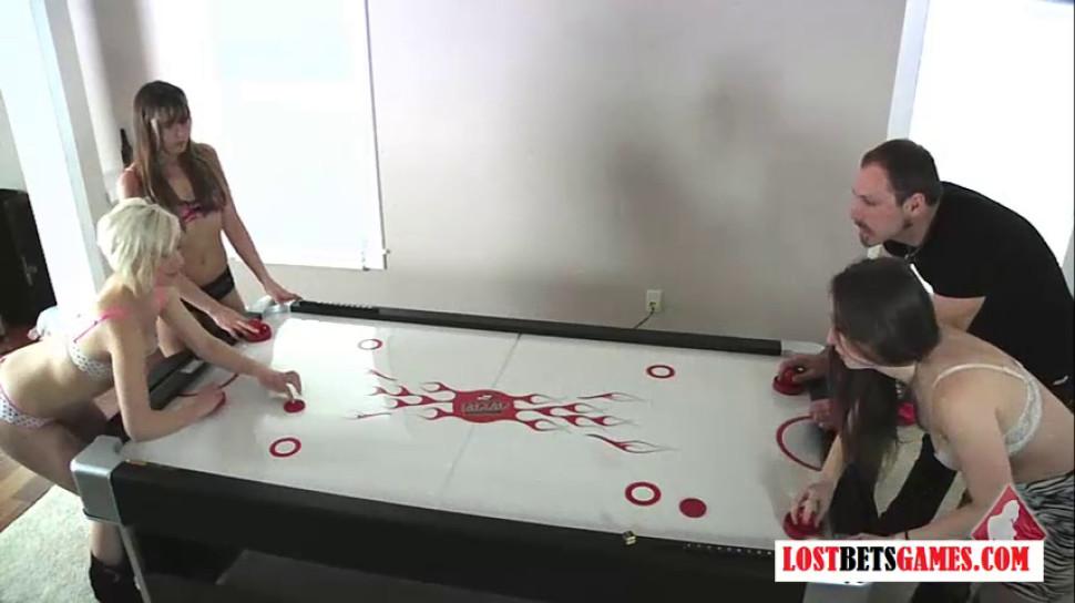 LOSTBETSGAMES - 3 girls and one guy play strip air hockey