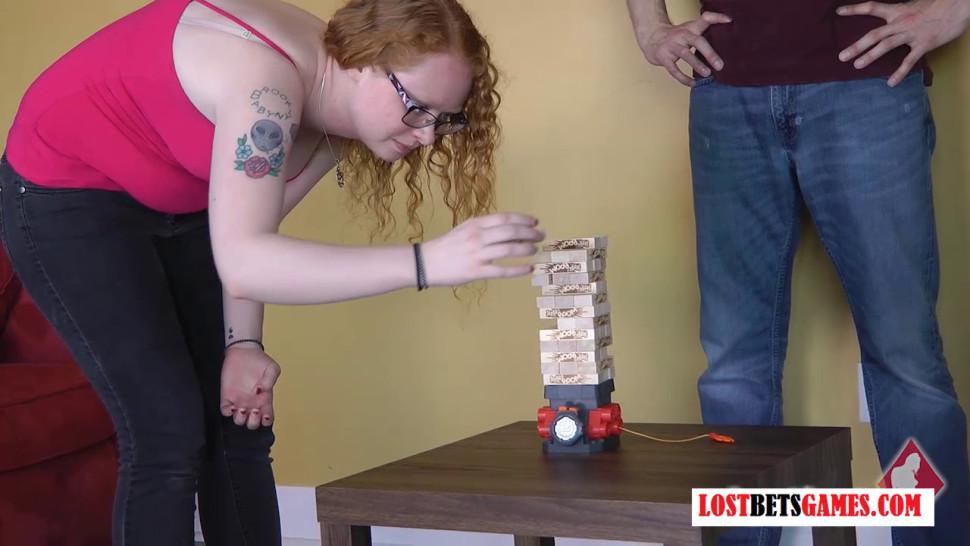 LOSTBETSGAMES - Lucky Dude Plays a Strip of Jenga Game with a Couple Nerds