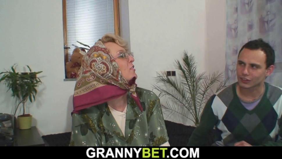 GRANNYBET - Hot four-eyed grandma spreads legs for him