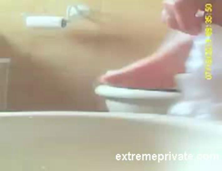 Hidden camera my Mom shaving pussy on toilet