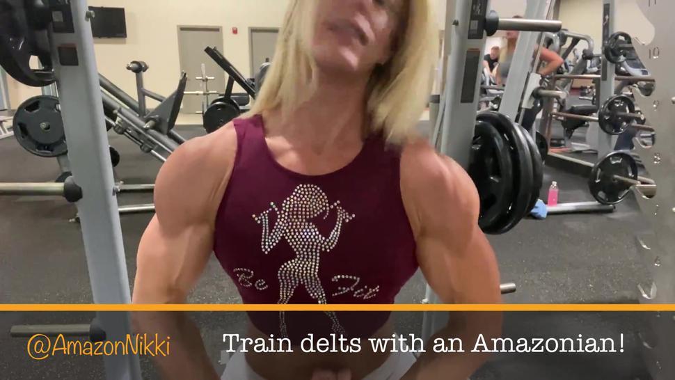 Muscular Amazon blasts shoulders in gym workout with hot white booty shorts!