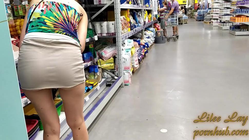 Risky flashing in public store with mini upskirt (many witnesses)