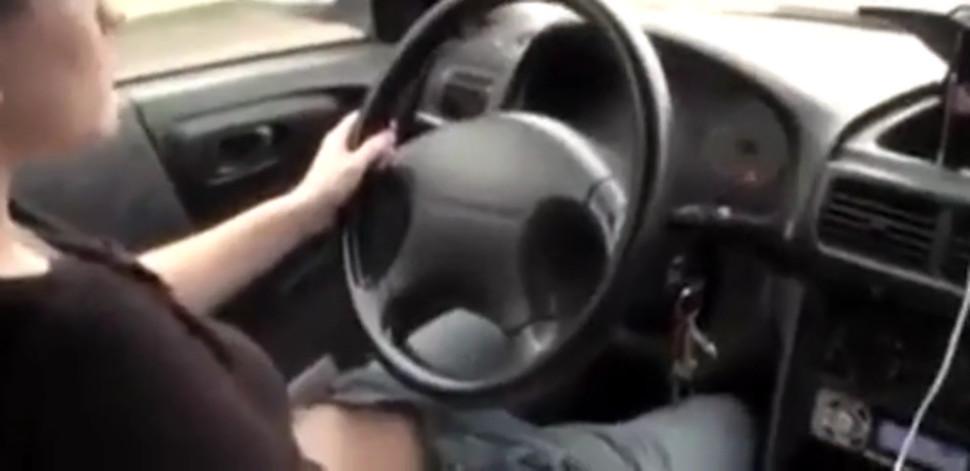 She Fingers Her Pussy While Driving
