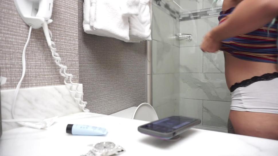 Hidden camera in hotel bathroom filming a hot slut as she showers
