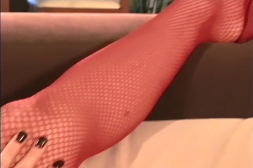 LINGERIE VIDEOS - Petite brunette in red fishnet stockings and heels