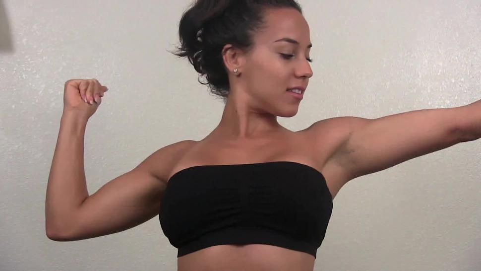 sexy girl flexing biceps