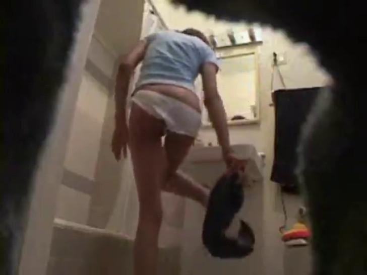 Hot teen caught naked in the bathroom on hidden cam
