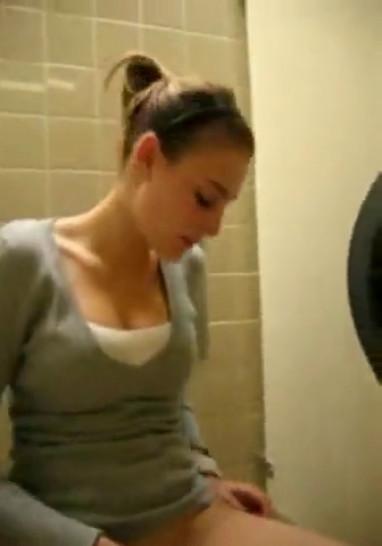 Girl Masturbates in rest room