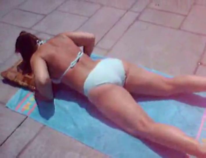 Girl in Bikini By The Pool