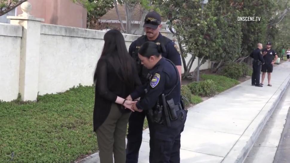 Female Arrested and Handcuffed