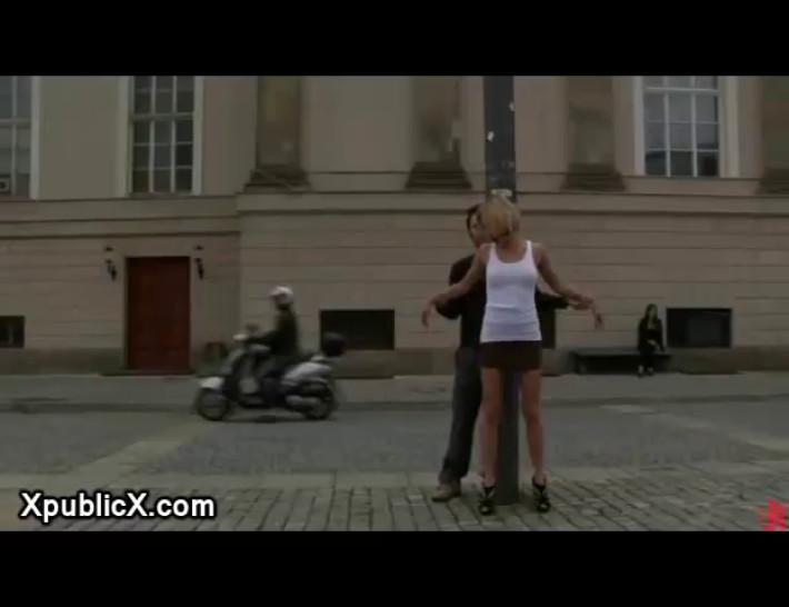 Blonde bound naked in the middle of a city square