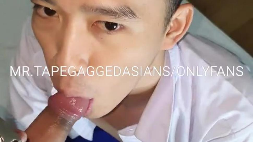 Thai student in school uniform blue shorts sucking my dick with nice eyes