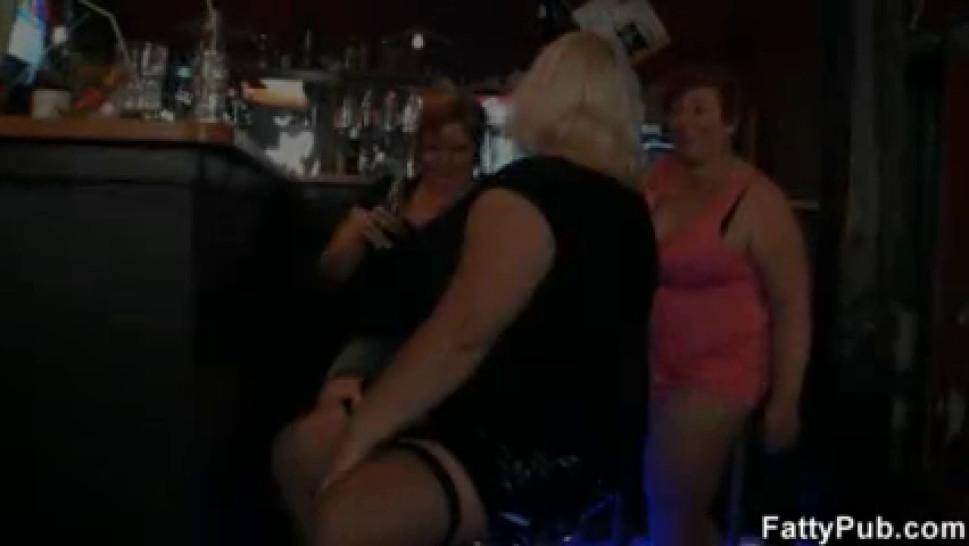 Three fat chicks have fun in the bar