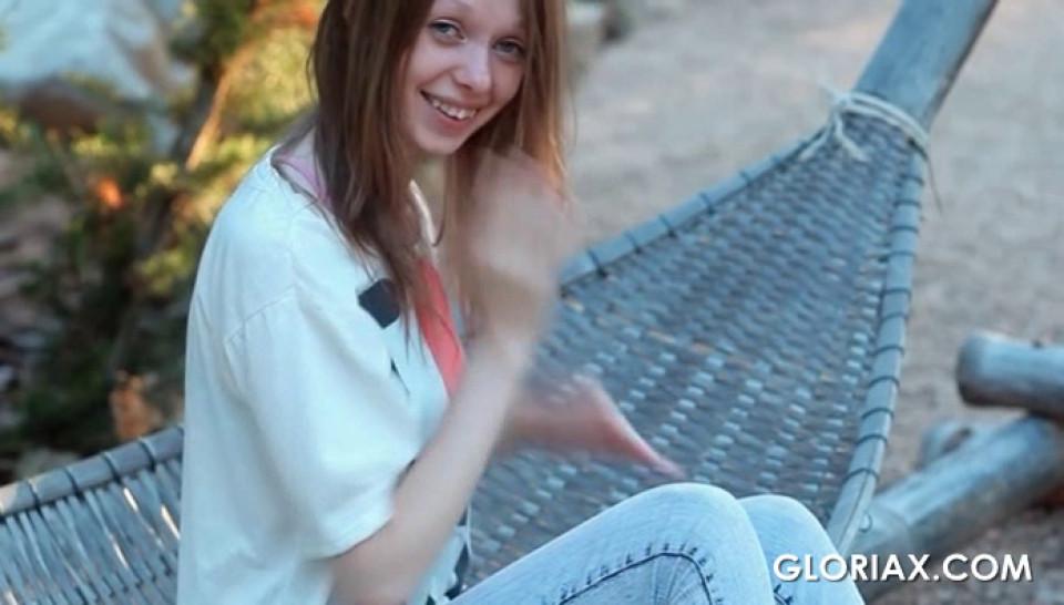 Skinny teen doll Gloria taking her clothes off outdoor
