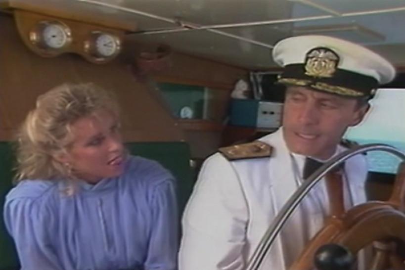 Candy Evans and John Leslie on a boat