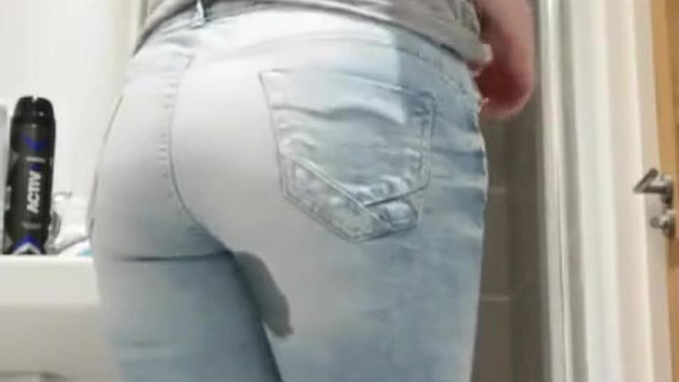 Girl pissing her pants