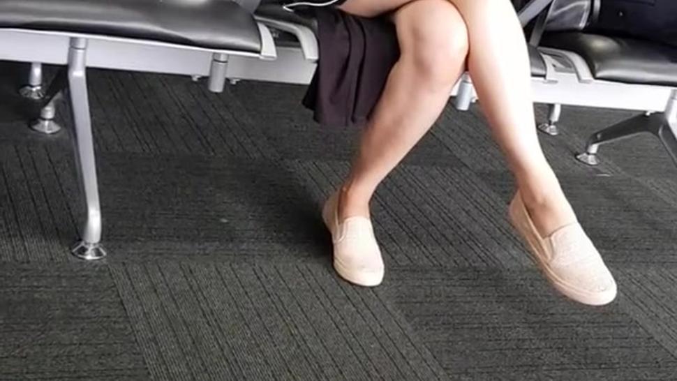 Candid Asian Legs waiting at the airport