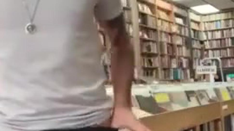 Exibitionist strips and masturbates in public library