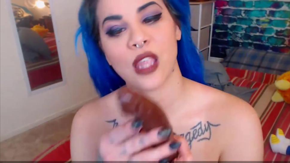 Blue haired gagging slut swallows big toy