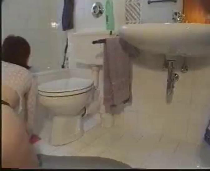 Red head teen scrubbing the floor and then rubbing herself