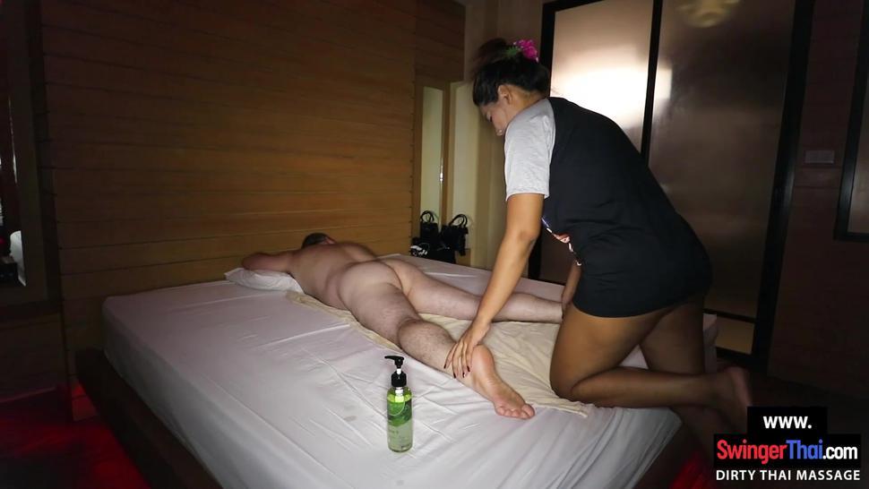 Cute amateur Asian girl gives her client a massage with a very happy end