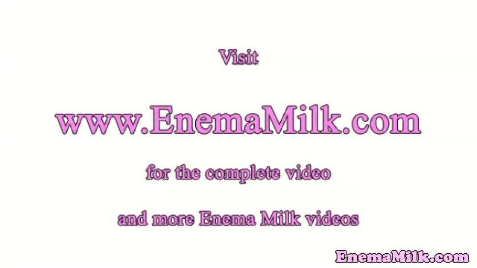 Milk enema lez shoots milk out of her asshole