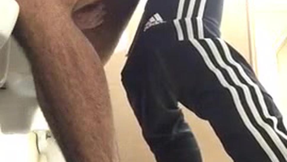 Guy fucks a hairy man and cums in his ass in public bathroom