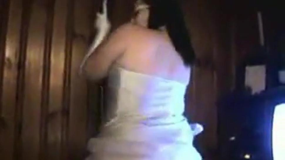 Chubby girl stripping in a white dress